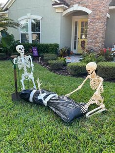 a skeleton laying on the ground in front of a house with a bag full of garbage