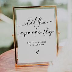 a sign that says let the sparkle fly on it