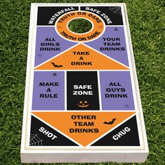 a cornhole board that is on the grass with halloween sayings and other words