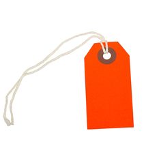 an orange tag hanging from a white string