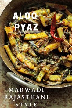 aloo pyaz recipe in a pan with the title above it