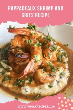 a white plate topped with shrimp and grits covered in gravy