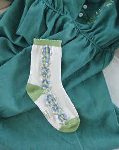 Women's Size 5-9. A vertical blossom design, inspired by 1950's Germanic embroidery design. Truly timeless, and appreciated by all floral sock lovers. Cotton Cute Cotton Socks For Spring, Cute Green Socks For Spring, Casual Floral Print Socks For Spring, Green Cotton Summer Socks, White Socks For Spring, Cute Blue Spring Socks, Flower Socks, Sock Lovers, Floral Socks