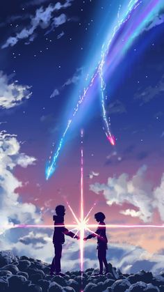 two people standing on top of a hill under a sky filled with clouds and stars