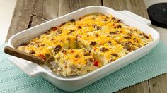 a casserole dish with sausage and cheese