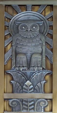 an art deco door with an owl on it