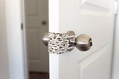 an open door with a ring on the handle