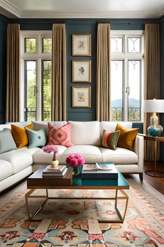 a living room filled with furniture and lots of window sill space next to a large rug