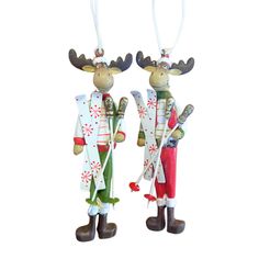 two christmas ornaments hanging from strings on a white background, one is wearing an antlers outfit and the other has a red nose