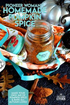 a jar filled with pumpkin spice sitting on top of a table next to other items