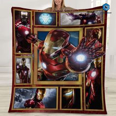 a woman holding up a blanket with photos of iron man and the avengerss on it