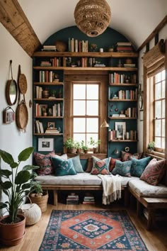 a living room filled with lots of furniture and bookshelves next to a window