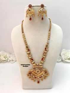 Matt gold finish Raani Haar(long necklace) comes with Earrings/bridal jewellery/south Indian long necklace Set/Rajwadi Rani Haar/Guttapusalu necklace/ one 1 gram gold/Ruby Green  All items are shipped from Brampton, Ontario, Canada. If you need your item by a certain day, please reach out to us for express delivery option before placing the order so that we can update the shipping for you. Standard shipping/delivery timeline Below are the estimated delivery times after the order is shipped/dispatched.  ---> USA delivery timeline * 3-5  business days to major urban centers in USA. It may take 2-3 days extra to remote locations ---> Canada delivery timeline  * 2-3 business days - GTA  & Montreal  * 2-4  business days - Rest of Ontario/Quebec * 4-6 business days-  Rest of Canada (Please consi Jewellery South Indian, Kundan Long Necklace, Guttapusalu Necklace, Brampton Ontario, Rani Haar, Gold Mangalsutra Designs, Gold Mangalsutra, Earrings Indian, Indian Jewelry Sets