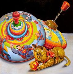 a painting of a cat laying on top of a table next to a colorful object