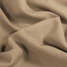 Experience the exceptional versatility and durability of Poly Poplin fabric at Fabricsonsale.com. Available in both 58/60" inches width and 110" width, this tight-knit 100% polyester fabric features a coarse grain texture and matte colorways with minimal sheen, making it ideal for various design projects. It is machine washable and dryable, providing unmatched ease of care for designers, event planners, and fabric retailers. Enhance your creations with a fabric that seamlessly combines strength and style. Explore our discounted wholesale options and invest in Poly Poplin today. - Exceptional versatility and durability - Available widths:- 58/60" - 110"- Tight-knit 100% polyester fabric- Coarse grain texture - Matte colorways with minimal sheen- Ideal for various design projects- Machine wa Gabardine Fabric, Suit Fabric, Poplin Fabric, Wrinkle Free, Cut And Color, Fabric By The Yard, Woven Fabric, The Face, Camel