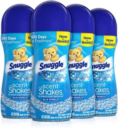 three bottles of snuggle scent shakes with blue sparkles on the front and back