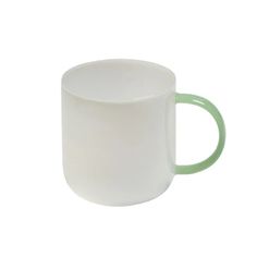 a white and green coffee mug on a white background with a light green rim around it