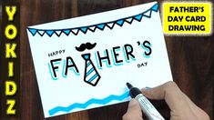 a father's day card with a hand holding a marker