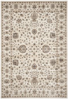 a beige and brown rug with an intricate design