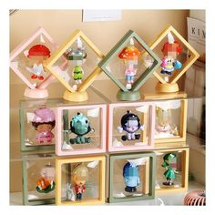 a display case filled with lots of little figurines on top of each other