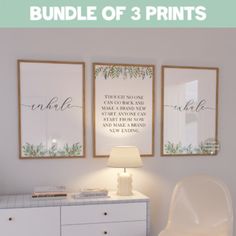 a white dresser sitting next to two framed pictures and a lamp on top of it