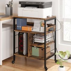 a printer sitting on top of a wooden shelf