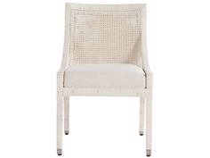 an upholstered white dining chair with wicker back and armrests, viewed from the front