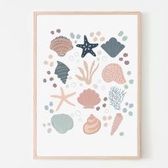 an art print with seashells and starfish in pastel colors on a white background