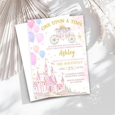 a birthday card with a princess carriage and balloons