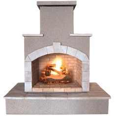 an outdoor fireplace is shown with firewood