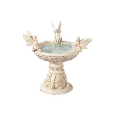 a white birdbath with two small birds on it's legs and wings