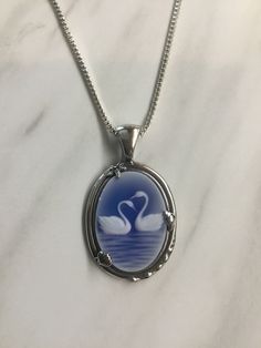 Swan Locket, Swan Accessories, Blue Gem Necklace, Ocean Outfits, Two Swans, Swan Jewelry, Blue Jewellery, Swan Necklace, Pretty Jewelry Necklaces