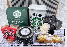 the starbucks coffee gift basket is full of goodies