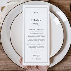 a white plate with a card on it that says,'thank you family and friends '