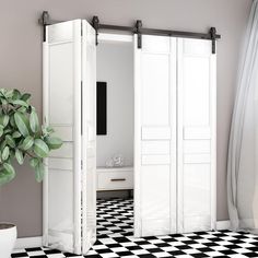 an open white closet door with black and white checkered flooring