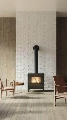 a living room filled with furniture and a fire place in the middle of the room