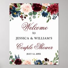 a welcome sign with flowers on it