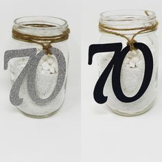 two mason jars with the numbers seventy and seventy on them