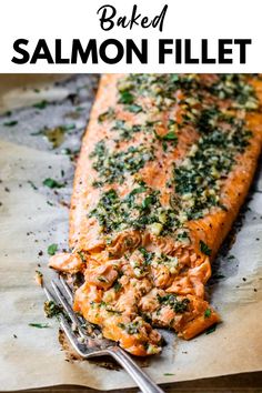 salmon fillet with herbs and seasoning on top