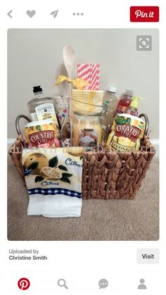 a basket filled with condiments and food on top of a carpeted floor