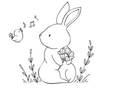 a rabbit sitting in the grass with flowers