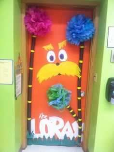 the lorax door is decorated with flowers