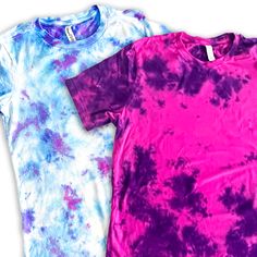 two t - shirts that have been dyed in different shades of purple, blue and pink