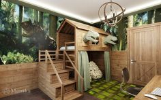 a room with a bunk bed, desk and stairs to the second floor is decorated with dinosaur wallpaper