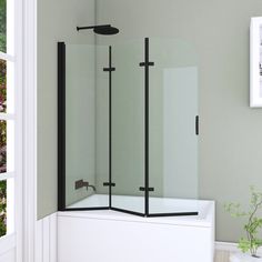 a bathroom with a corner shower and white walls