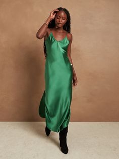 Crafted from glossy silk charmeuse, this washable slip dress is luxury at its best as its cut on the bias to give it stunning drape.  COLUMN FIT: Semi-fitted, straight through the waist, hip, and thigh.  V-neck with adjustable slider straps.  Rounded shirttail hem with 22" side slits.  Unlined.  Column Fit: Semi-fitted through the chest, straight through the waist, hip, and thigh.  Sleeveless.  Maxi length.  Front body length (size S): Petite 53. 5", Regular 57", Tall 60. 5" Model: Size S or XL, Summer Cocktail Attire, Snake Print Dress, Silk Maxi, Silky Dress, Maxi Slip Dress, Silk Midi Dress, Stretchy Dress, Silk Maxi Dress, Sleeveless Floral Dress