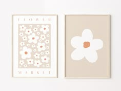 two framed art prints with flowers on them, one is pink and the other is white