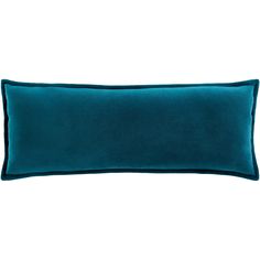 the teal blue velvet pillow is on display