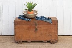 "Antique campaign chest, originally designed for travelers. Crafted from durable teak wood and adorned with original brass carrying side handles, this chest is a testament to craftsmanship and heritage. Its authentic charm lies in the oxidize finish that showcases the character of the wood. The top of this antique campaign chest opens to reveal a small interior compartment, adding to its versatility and functionality. Whether as a decorative piece, a coffee table or a practical storage solution, this chest carries the stories of journeys and adventures. *Era: Antique *Material: Teak *Size: 36\"(L) x 18\"(D) x 20.5\"(H) *Color: Brown *Condition: Wear consistent with age & use, blemishes and imperfections will be present. These are not to be consider defects but rather part of its character Chinese Window, Campaign Chest, Chest Opening, Studio Photography Lighting, Wooden Statues, Bench Furniture, Storage Solution, Teak Wood, A Coffee