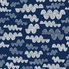 a blue and white pattern with hearts on it